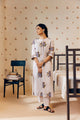 Off-white handwoven khadi cotton tunic featuring a red poppy hand block print, paired with mustard yellow striped pants; an ethnic set blending traditional craftsmanship with contemporary design.
