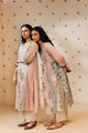 Off-white empire cut tunic set with marigold block prints, inspired by nature and ethically made from soft, breathable fabric for a graceful, sustainable look.