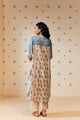 "Off-white hand block printed cotton mulmul tunic set showcasing intricate artisan patterns, crafted from lightweight, breathable fabric for effortless style and comfort."