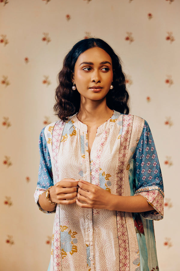 "Off-white hand block printed cotton mulmul tunic set showcasing intricate artisan patterns, crafted from lightweight, breathable fabric for effortless style and comfort."
