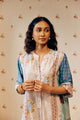 "Off-white hand block printed cotton mulmul tunic set showcasing intricate artisan patterns, crafted from lightweight, breathable fabric for effortless style and comfort."