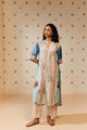 "Off-white hand block printed cotton mulmul tunic set showcasing intricate artisan patterns, crafted from lightweight, breathable fabric for effortless style and comfort."