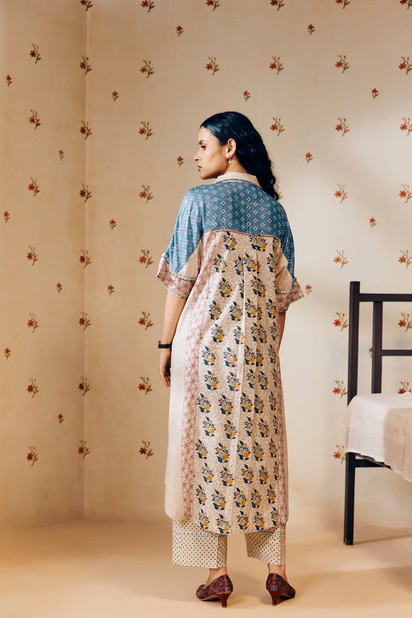"Off-white cotton mulmul tunic set with intricate hand block prints, gracefully tailored for a flattering fit and sustainably made for conscious living."
