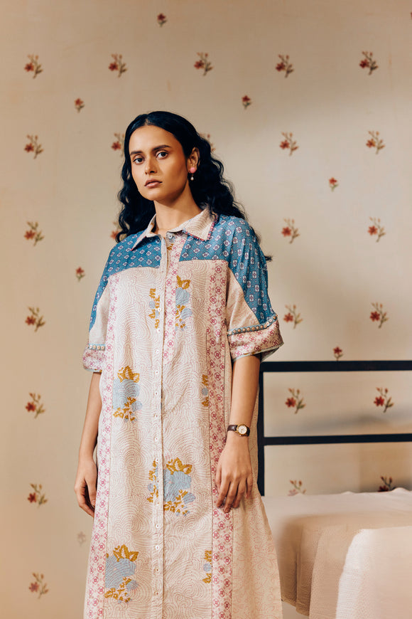 "Off-white cotton mulmul tunic set with intricate hand block prints, gracefully tailored for a flattering fit and sustainably made for conscious living."
