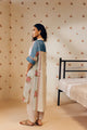 "Off-white hand block printed cotton mulmul tunic set featuring minimalist design with intricate artisan detailing, offering breathable comfort and timeless elegance."