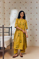 "Mustard tunic set with hand block rose prints, crafted from soft, breathable fabric, blending timeless artisan craft with effortless elegance."