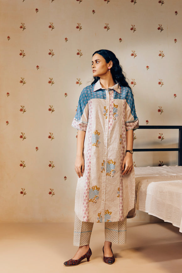 "Off-white cotton mulmul tunic set with intricate hand block prints, gracefully tailored for a flattering fit and sustainably made for conscious living."
