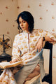 Summer off-white handwoven khadi cotton tunic with mustard and powder pink poppy hand block print, paired with powder pink striped pants; a lightweight, handcrafted co-ord set perfect for warm-weather styling.