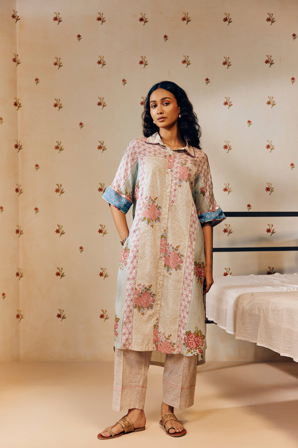 "Off-white hand block printed cotton mulmul tunic set featuring minimalist design with intricate artisan detailing, offering breathable comfort and timeless elegance."
