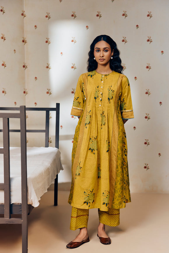 "Mustard tunic set with hand block rose prints, crafted from soft, breathable fabric, blending timeless artisan craft with effortless elegance."