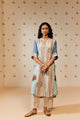 "Off-white hand block printed cotton mulmul tunic set showcasing intricate artisan patterns, crafted from lightweight, breathable fabric for effortless style and comfort."