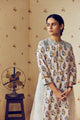 Summer-perfect off-white handwoven khadi cotton tunic featuring blue and mustard flower bunch hand block print, paired with dark blue striped pants; a breathable, handcrafted ethnic co-ord set ideal for warm weather.